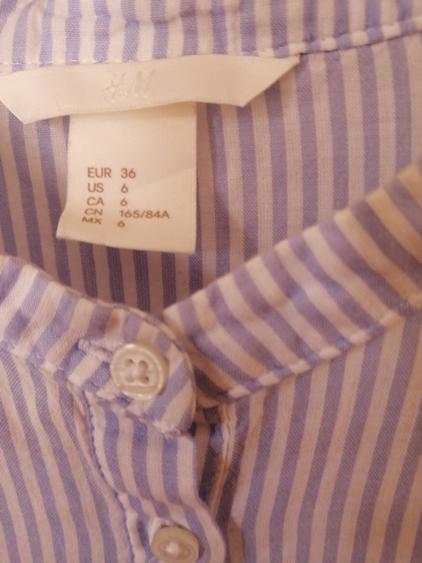 Blusa delgada cuello Mao H&M